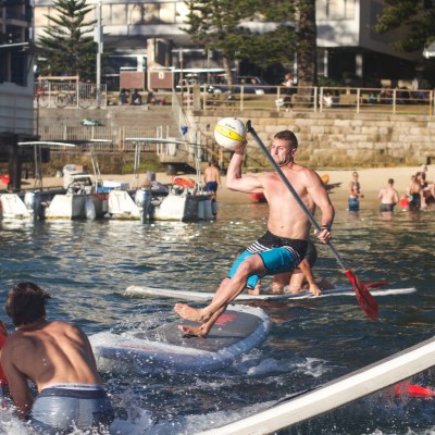 Guy catching a ball in SUPBALL game