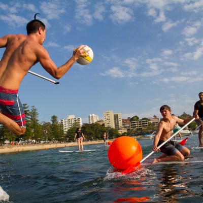 Guy holding a ball in SUPBALL game