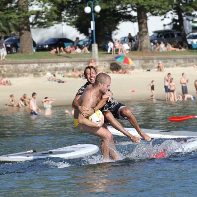 Guy tackling another player in SUPBALL game